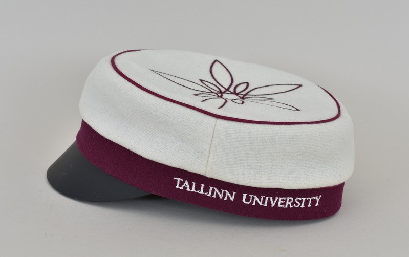 White and maroon cap with "Tallinn University" text against a white background.