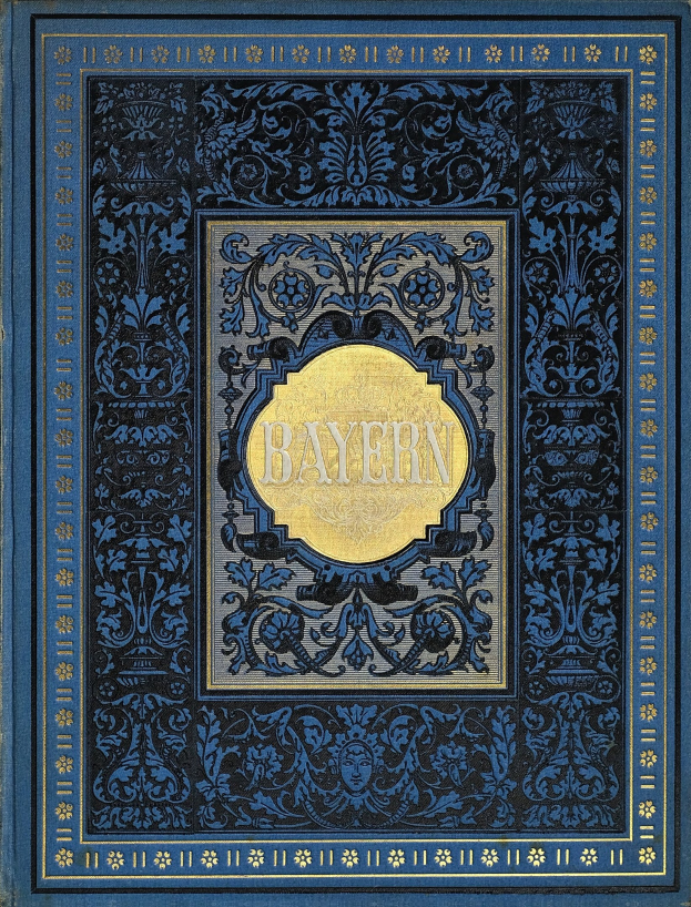 A blue and gold book with the word "Bayern" on the cover, featuring intricate decorative designs.