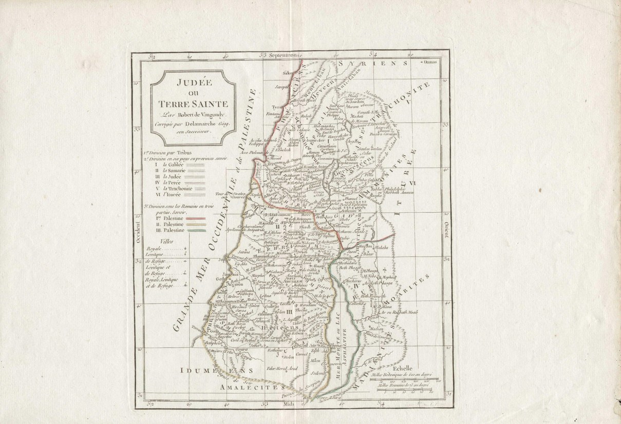 An old book with a detailed map of Israel's provinces and cities on its cover, accompanied by explanatory text.