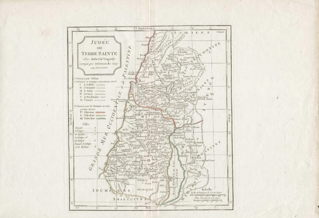 An old book with a detailed map of Israel's provinces and cities on its cover, accompanied by explanatory text.