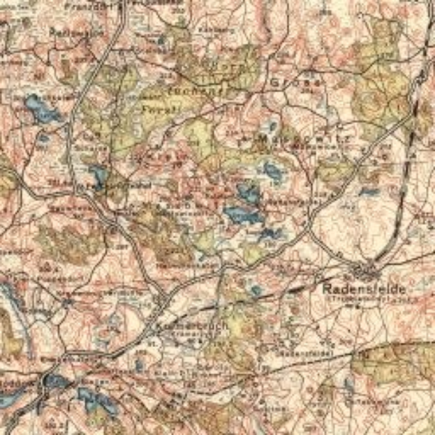 Old topographic map of Radensfelde, Germany, showing roads, buildings, and landmarks with intricate lines and shapes.
