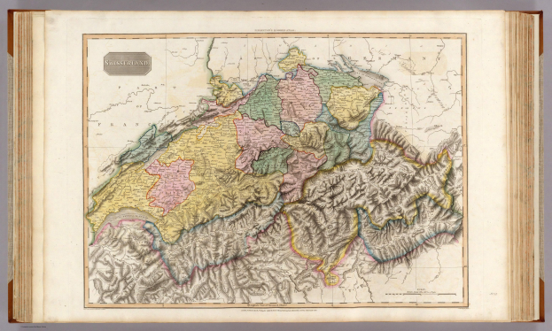 Ein altes Buch mit einer detaillierten Karte von der Schweiz auf dem Cover, das Regionen und Nachbarländer zeigt, begleitet von beschreibendem Text.