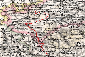 Alte Deutschlandkarte mit einer roten Linie, begleitet von detaillierten Textannotationen.