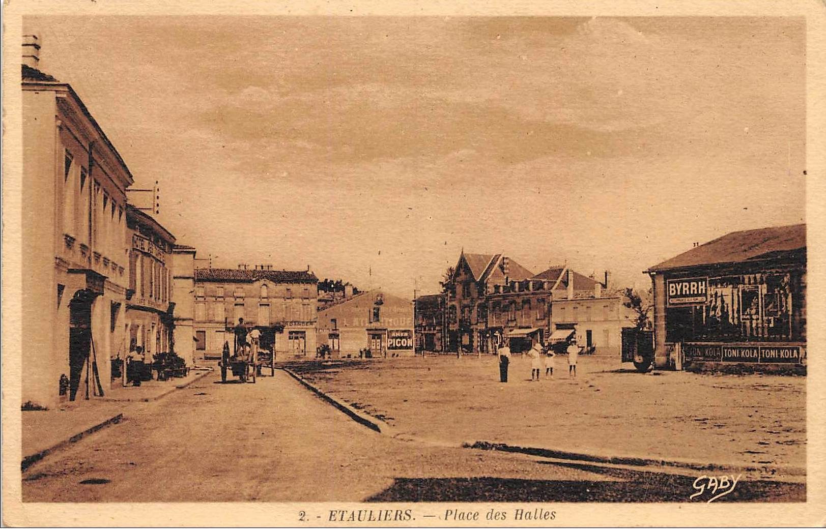 Old black and white photograph of a city street labeled "Place des Halles" with buildings, people, carts, poles, trees, and a sky in the background.