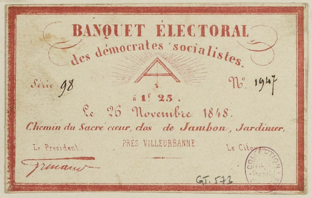 Alter Umschlag mit rotem Rand und Stempel, beschriftet mit "Banquet Electoral des Democrates Socialistes".